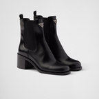 Brushed leather booties Black – upper with elasticized side gusset and pull tab Leather lining Enameled metal – LUX VERSE Luxury Designer Fashion Outlet