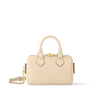 Speedy Bandoulière 20 Crème Beige – one of the House’s classic silhouettes, the Speedy Bandoulière 20 handbag takes on – LUX VERSE Luxury Designer Fashion Outlet