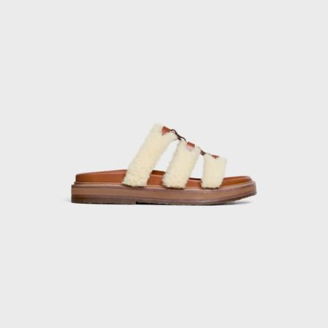 TIPPI SLIDE in SHEARLING AND CALFSKIN – 50% SHEARLING 50% CALFSKIN100% CALFSKIN LINING1.2 IN (30 MM) heelSTRAPS – LUX VERSE Luxury Designer Fashion Outlet