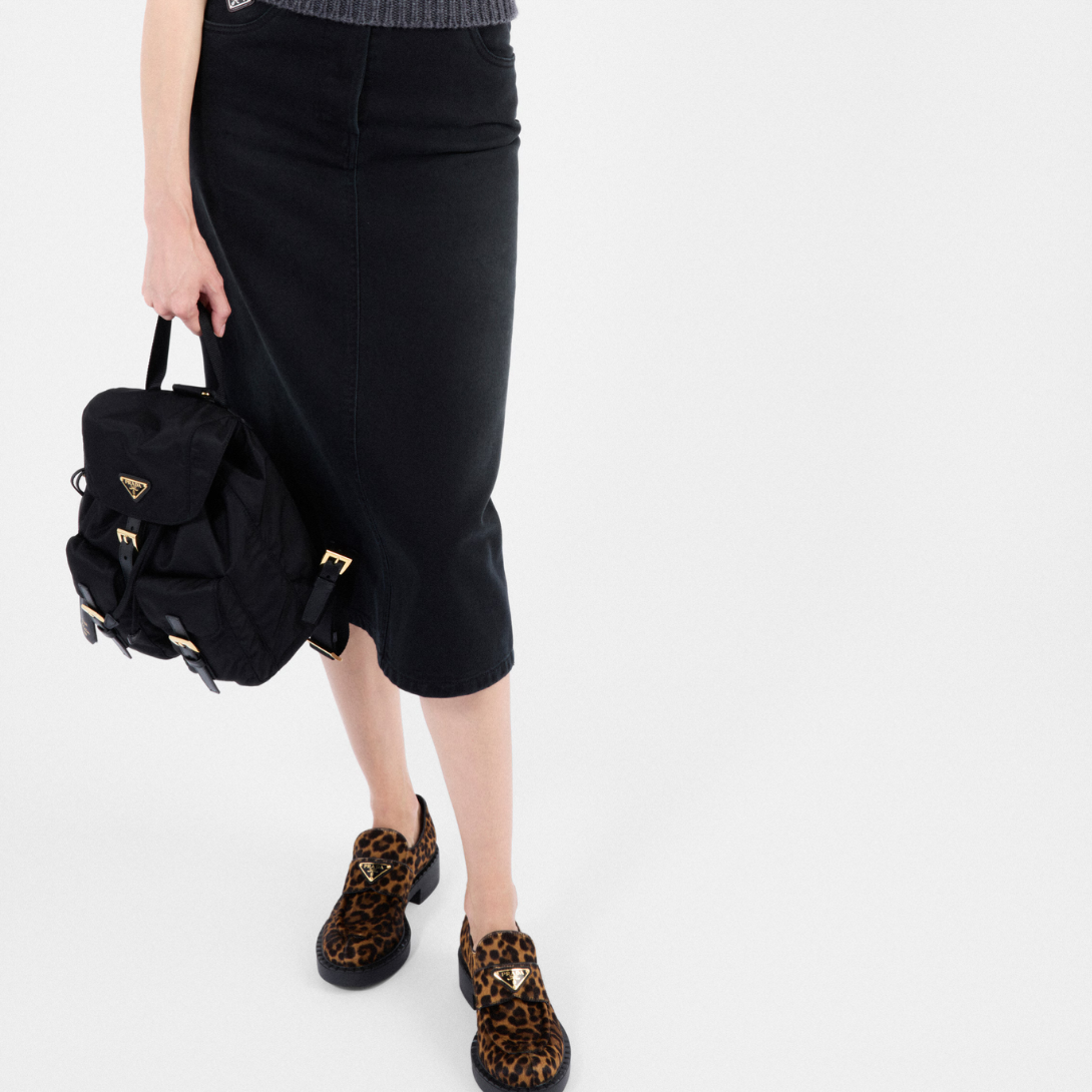 Chocolate printed leather loafers – the leopard-print leather gives the iconic shoes a new attitude, and the triangle – LUX VERSE Luxury Designer Fashion Outlet