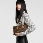 OnTheGo East West Brown – fitted with two Toron top handles and a wide, detachable strap, this beautifully – LUX VERSE Luxury Designer Fashion Outlet