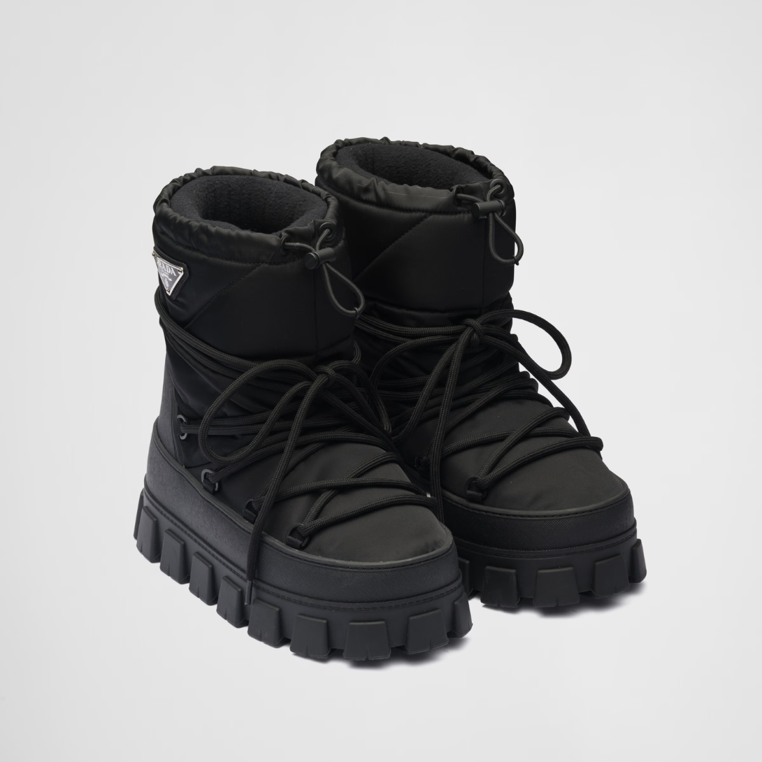 Re-Nylon gabardine après-ski boots – made of leather and nylon, an industrial fabric traditionally tied to the brand, – LUX VERSE Luxury Designer Fashion Outlet