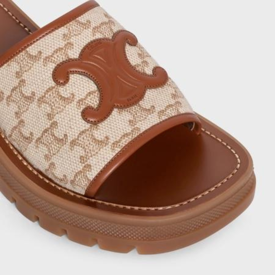TRIOMPHE SLIDE in TRIOMPHE STAMPED CANVAS & CALFSKIN – dEBOSSED UNDER THE OUTSOLESLIP-ONLEATHER INSOLECHUNKY LUG RUBBER OUTSOLE – LUX VERSE Luxury Designer Fashion Outlet