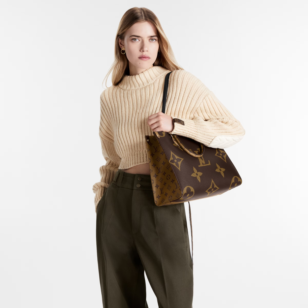 OnTheGo M – with Giant Monogram canvas on one side and Monogram Reverse on the other, it is – LUX VERSE Luxury Designer Fashion Outlet