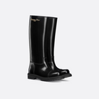 Christian Paris signature Boot – constructed in black brushed calfskin, the silhouette is accented by the gold-finish – LUX VERSE Luxury Designer Fashion Outlet