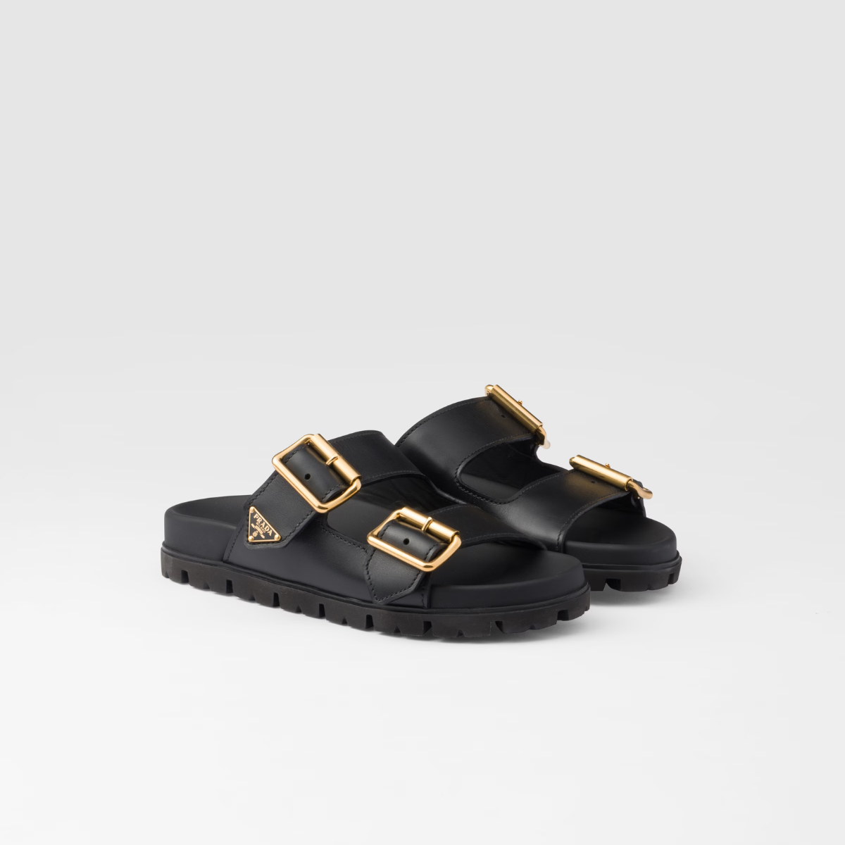 Leather strap slides – this versatile footwear characterized by straps with metal buckles are completed – LUX VERSE Luxury Designer Fashion Outlet
