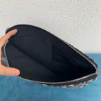 Mehrfarbige Clutch