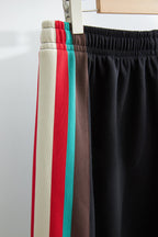 Schwarzer Jersey mit Seitenstreifen und Kordelzug – Herren