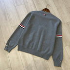 Marineblauer Cardigan mit Ärmelstreifen aus Wolle – Herren