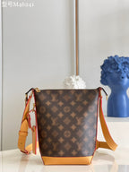 Braune und gelbe Beuteltasche