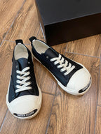 Schwarze Canvas-Low-Top-Sneaker mit Zehenkappe – Herren