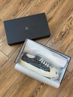 Schwarze Canvas-Low-Top-Sneaker mit Zehenkappe – Herren