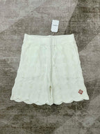 Weiße Strick-Badeshorts mit Kordelzug und Wellenrand – Herren