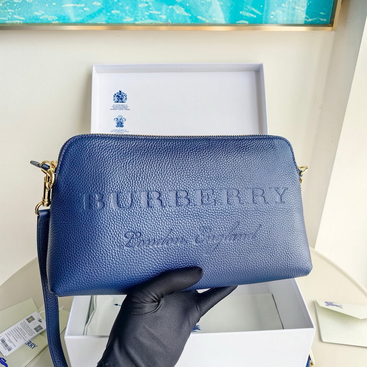 Schwarz-blaue Clutch