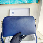Schwarz-blaue Clutch