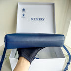 Schwarz-blaue Clutch