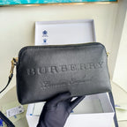 Schwarz-blaue Clutch