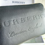 Schwarz-blaue Clutch