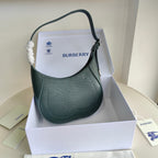 Schultertasche in Schwarz und Grün