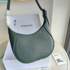 Schultertasche in Schwarz und Grün