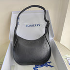 Schultertasche in Schwarz und Grün