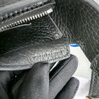 Schultertasche in Schwarz und Grün