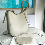Schultertasche in Schwarz und Grün
