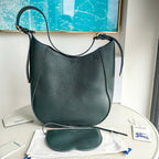 Schultertasche in Schwarz und Grün