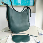 Schultertasche in Schwarz und Grün