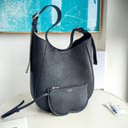 Schultertasche in Schwarz und Grün