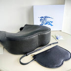 Schultertasche in Schwarz und Grün