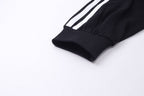 Schwarzes Jersey Langarmshirt mit gestreiften Ärmeln – Herren