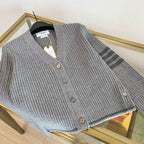 Gerippte Strickjacke aus grauer Wolle – Damen