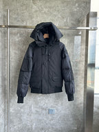 Schwarze Kapuzen-Pufferjacke aus Nylon – Herren