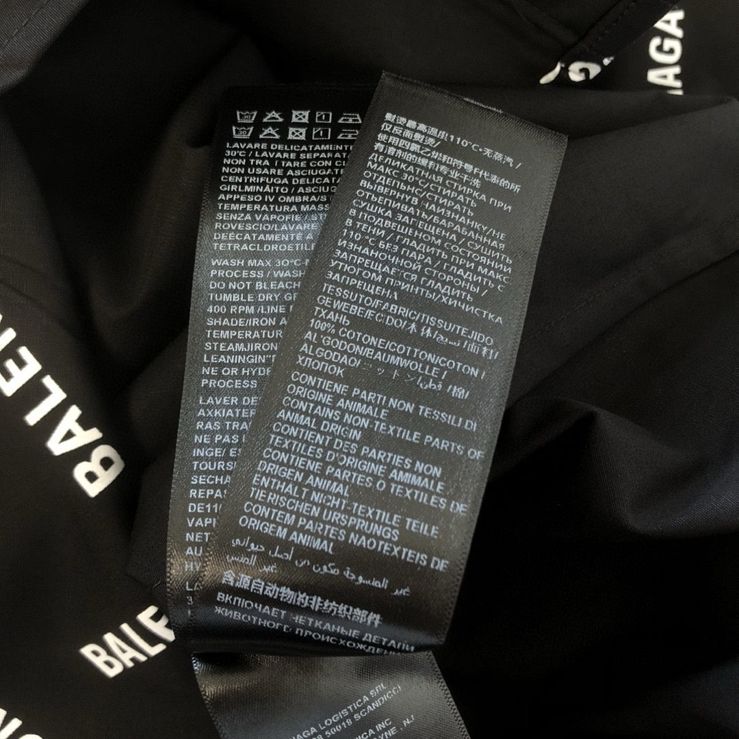 Schwarzes Langarmshirt aus Baumwolle mit Textprint – Herren