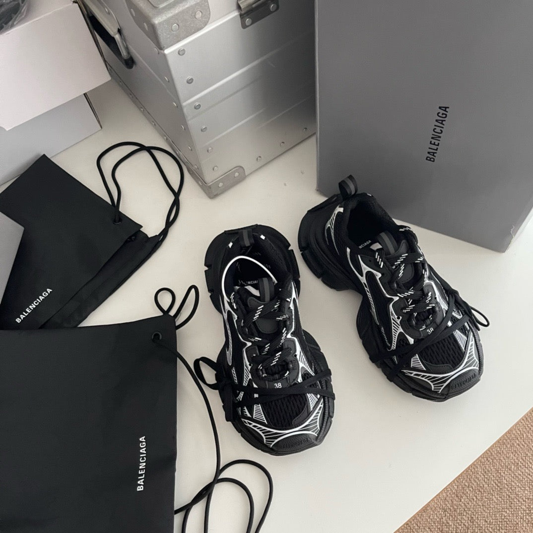Sneaker Caged Panel Runner Schwarz-Silber