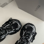 Sneaker Caged Panel Runner Schwarz-Silber