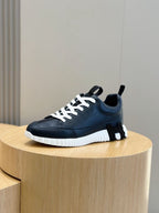 Marineblaue Low-Top-Sneaker aus Veloursleder und Einsätzen – Herren