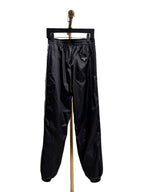 Schwarze Nylon-Jogginghose für Herren mit Seitenstreifen