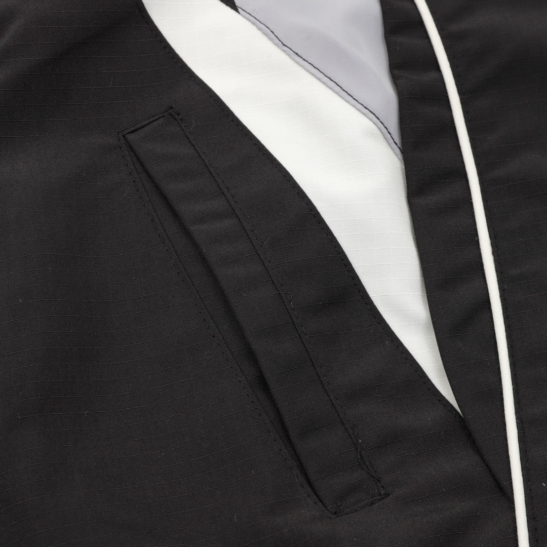 Schwarze Nylon-Trainingshose mit Einsätzen – Herren