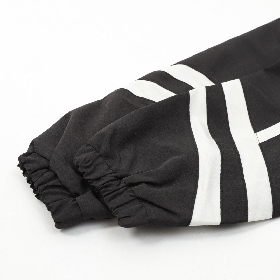 Schwarze Nylon-Trainingshose mit Einsätzen – Herren