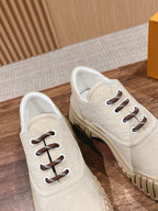 Beige Leder-Stiefelette mit Profilsohle – Damen