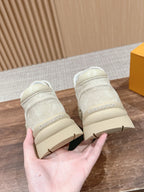 Beige Leder-Stiefelette mit Profilsohle – Damen