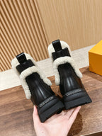 Black Leather Shearling-Lined Ankle Boot - Women's