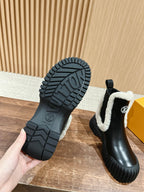 Black Leather Shearling-Lined Ankle Boot - Women's