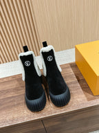 Black Leather Shearling-Lined Ankle Boot - Women's