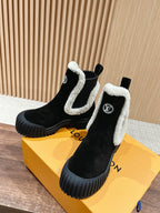 Black Leather Shearling-Lined Ankle Boot - Women's