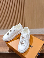 Schwarze Leder-Monogramm-Low-Top-Sneaker – Damen