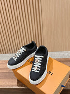 Schwarze Leder-Monogramm-Low-Top-Sneaker – Damen