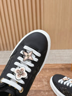 Schwarze Leder-Monogramm-Low-Top-Sneaker – Damen